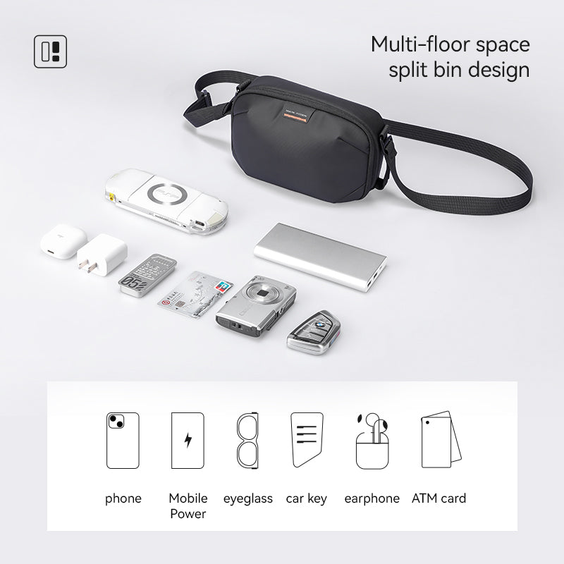 Black Oxford Voyager durable water-resistant crossbody bag with multi-floor space split bin design, holding phone, mobile power, eyeglass, car key, earphone, and ATM card.