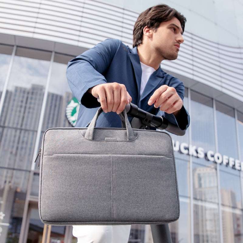 Gray business laptop bag 13.3-15.6 inch, Mark Ryden Global urban setting