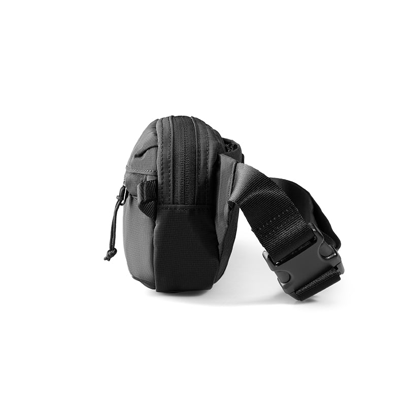 Black ultra-light anti-theft crossbody bag with RFID-safe protection, sleek design, adjustable strap, and zippered compartments.