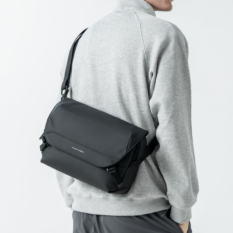 Black waterproof sling bag for urban gamers, Mark Ryden, modern style