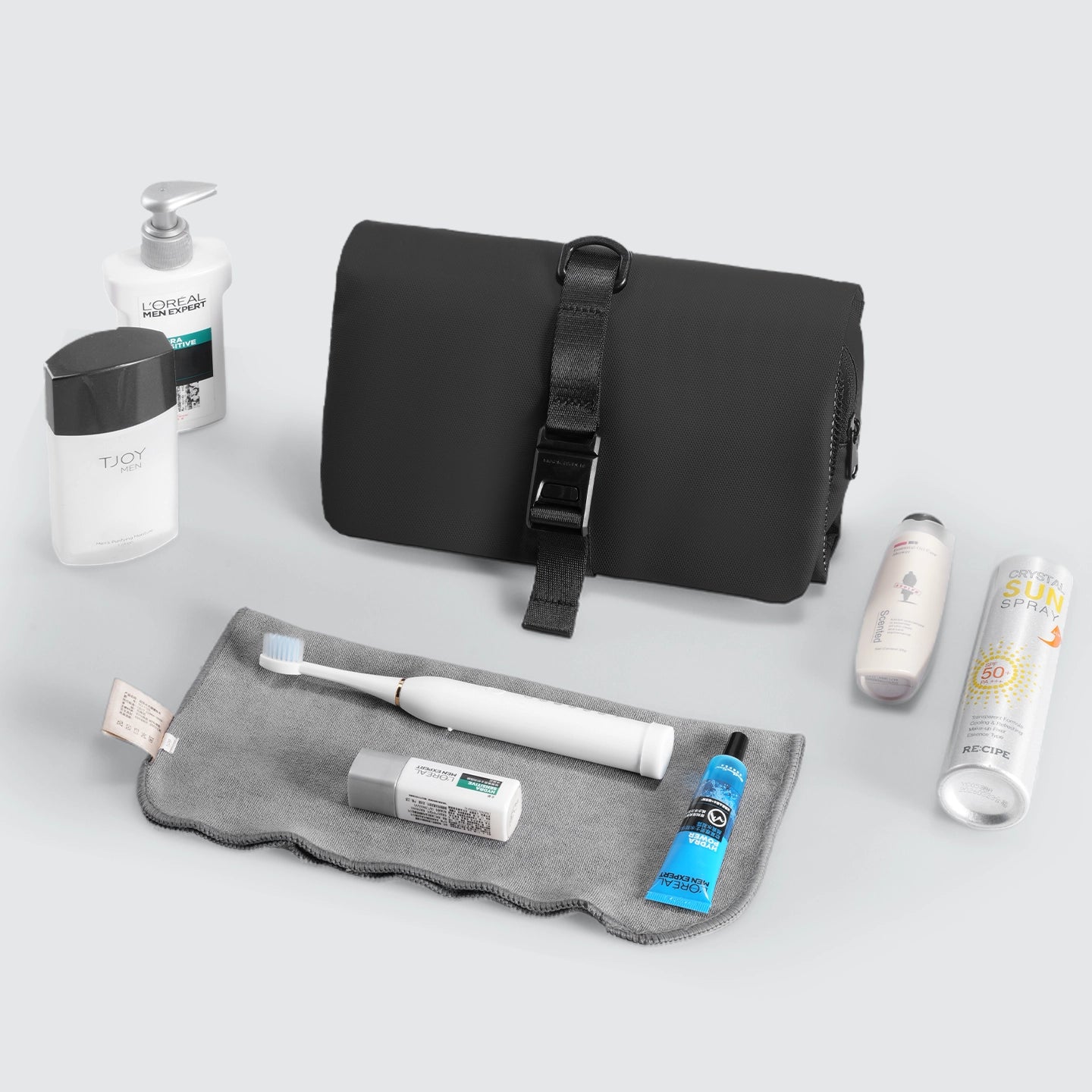 MarkRyden Global black wet-dry toiletry bag with toothbrush holder and adjustable strap
