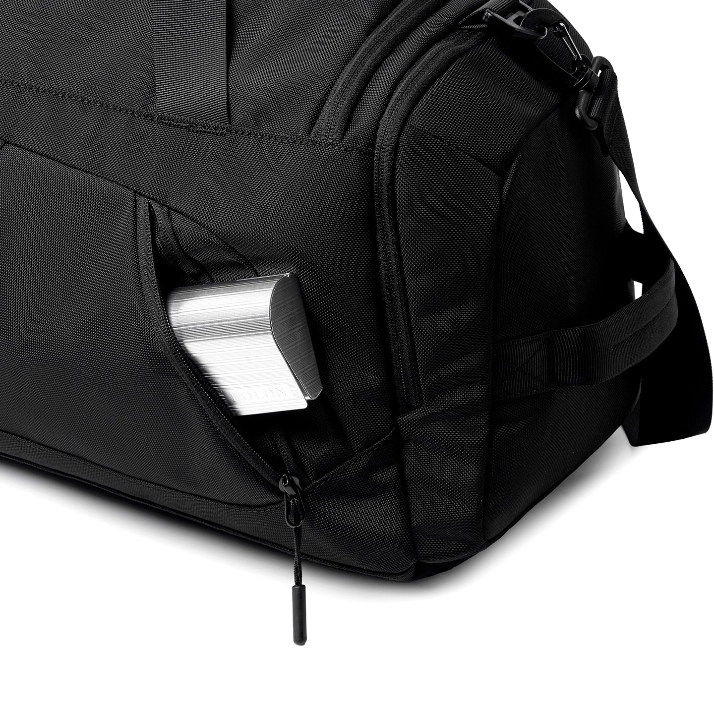 Black Worksman II gym duffel with wide-open pocket holding silver accessory - MARK RYDEN Global