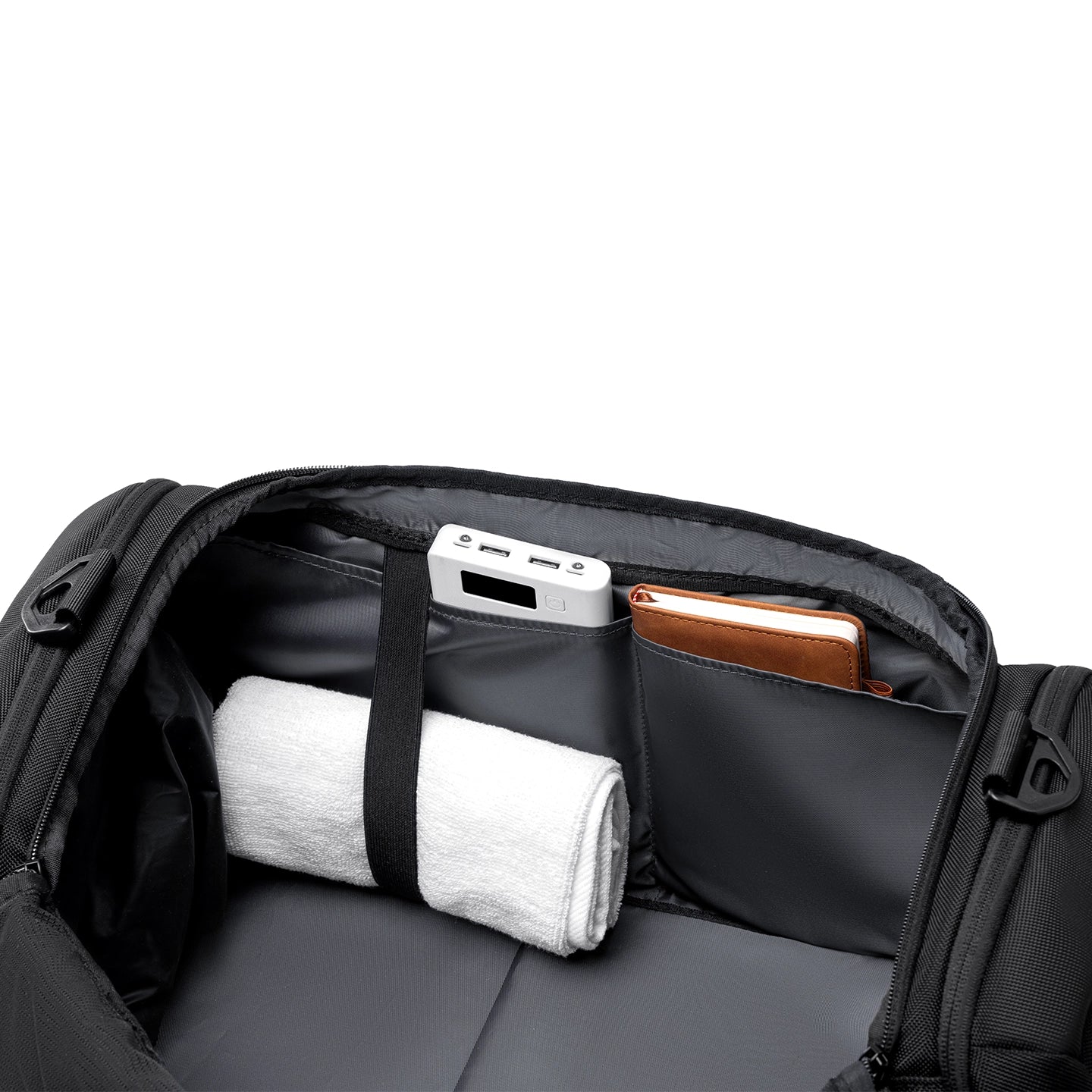 Black Worksman II duffel interior with towel, power bank, notebook - MARK RYDEN Global