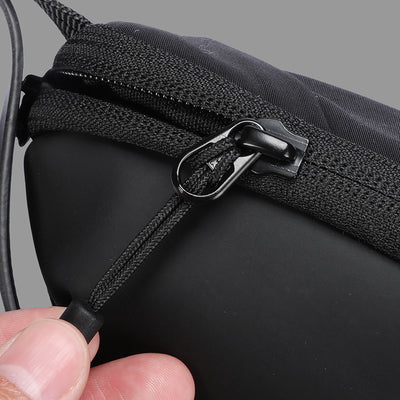 MarkRyden black anti-theft travel bag zipper with carabiner detail