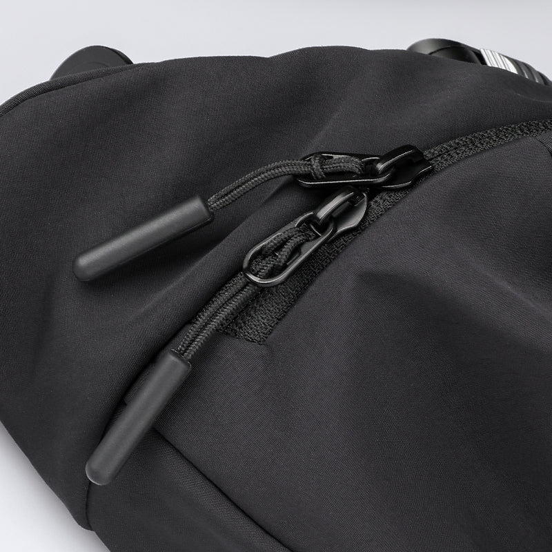 Mark Ryden Global ChillFlex black anti-theft sling bag zipper detail