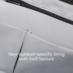 Oxford Voyager backpack interior with outdoor-specific twill lining, durable gray oxford fabric, and water-resistant design.