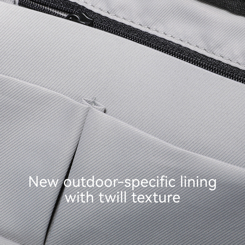 Oxford Voyager backpack interior with outdoor-specific twill lining, durable gray oxford fabric, and water-resistant design.