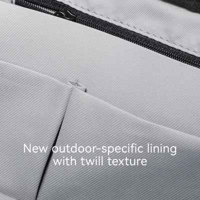 Oxford Voyager backpack interior with outdoor-specific twill lining, durable gray oxford fabric, and water-resistant design.