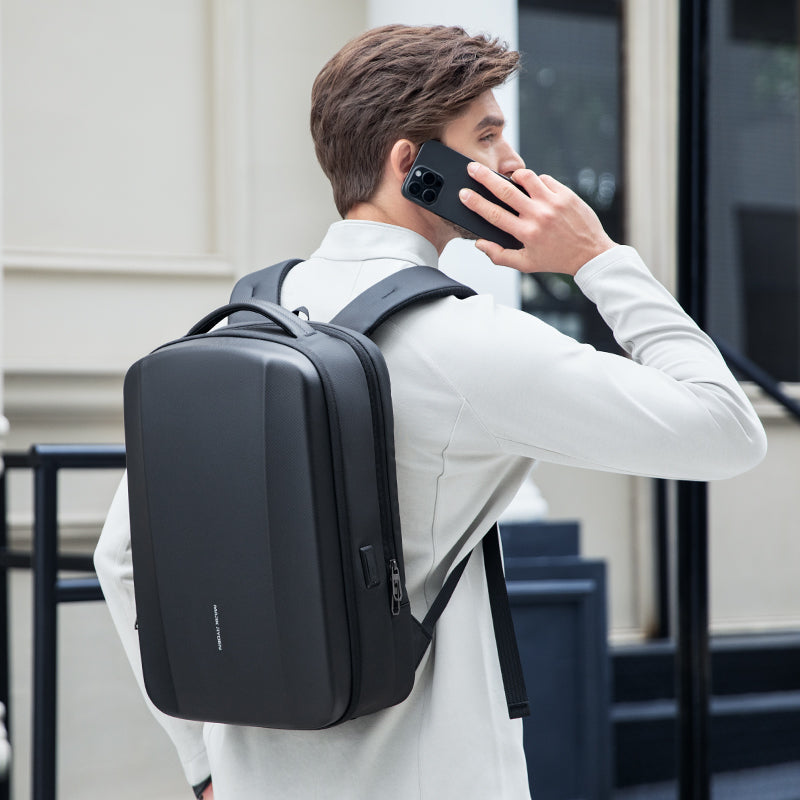 MarkRyden Global black hard-shell waterproof laptop backpack with arc compartments