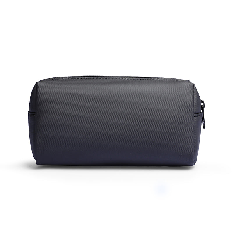 Dark gray portable large capacity traveling toiletries bag with zippered closure, ideal for organizing travel essentials.
