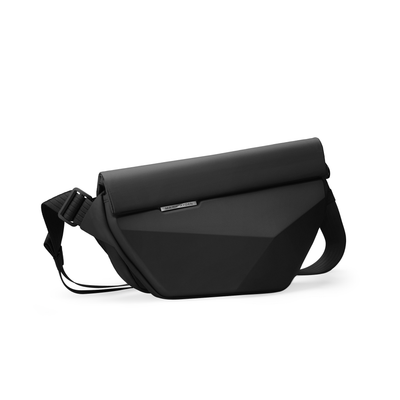 Black Diamond Facets large capacity crossbody bag with roll-top closure, scratch-resistant hard case, and adjustable strap from MARK RYDEN Global.