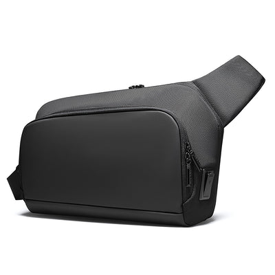 Sleek black waterproof crossbody bag featuring rectangular main compartment, zippered side pocket, textured strap, and USB port for daily use.