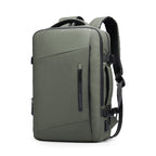 Olive green expandable laptop backpack with front zippered pocket, padded adjustable straps, and USB port—versatile for all-day travel by MARK RYDEN Global.