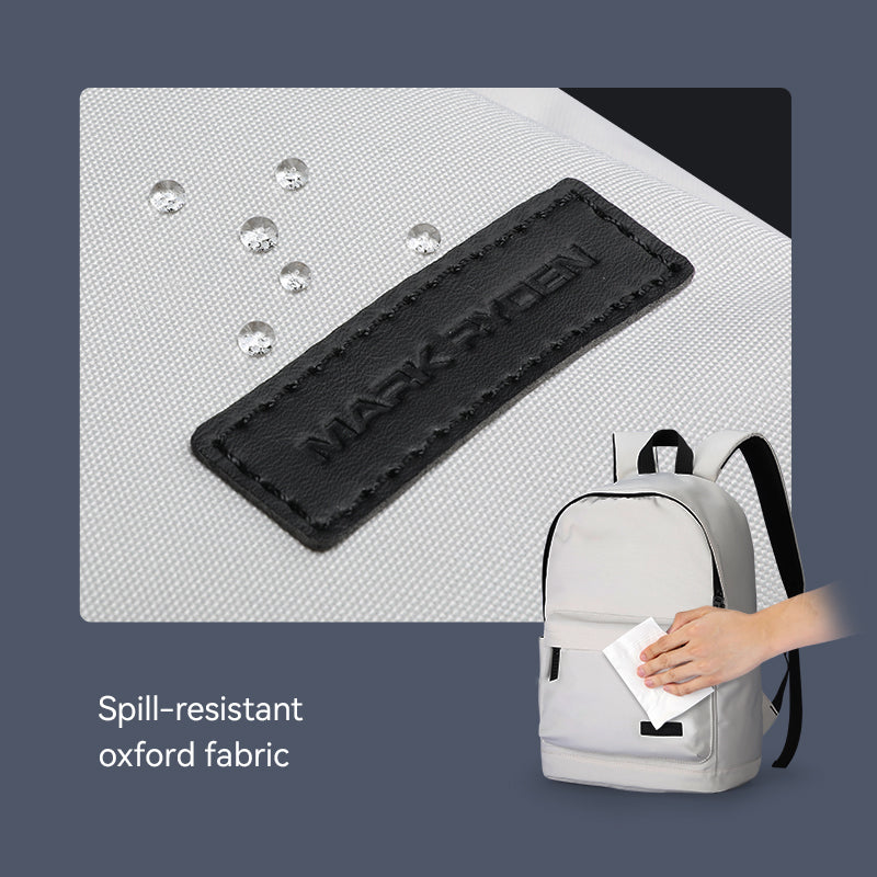 MarkRyden gray daily backpack with black branded patch, spill-resistant oxford fabric