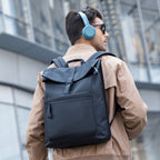 Mark Ryden black leather casual multilayer backpack worn by man in city