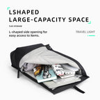 Mark Ryden Global leather casual multilayer storage backpack with L-shaped opening, holding travel gear