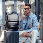 MarkRyden Global gray multi-functional combination backpack on luggage, modern traveler scene