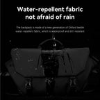 Black TravelProPack backpack with water-repellent Oxford fabric, showing water beading and running off to demonstrate waterproof and dirt-resistant properties.