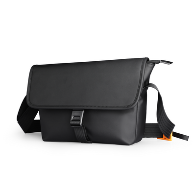 Black business casual crossbody bag with buckle closure by Mark Ryden Global