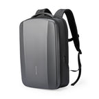 Mark Ryden Ratio Arc Compartment Hard-shell Waterproof Laptop Backpack gray with black straps, featuring a side USB port and sleek hard-shell design.