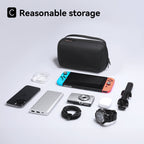 Black waterproof 3C storage bag with electronics, Mark Ryden Global