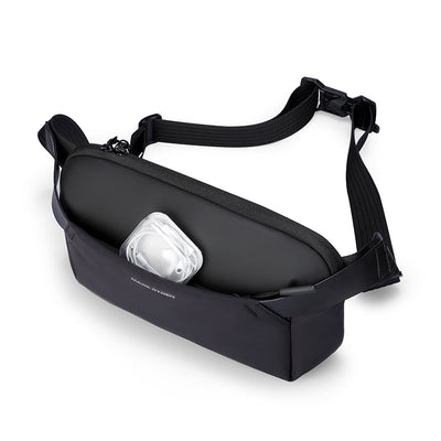 Black Mark Ryden Vivi waist bag with adjustable strap, zippered compartment holding clear AirPods case – ultimate travel companion for modern travelers.