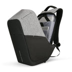 Mark Ryden Mocchasio anti-theft backpack in gray and black, featuring USB charging, open compartments with laptops, modern textured design for secure travel.