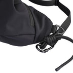 Black ChillFlex sling bag with adjustable strap, carabiner & paracord detail - modern anti-theft travel accessory
