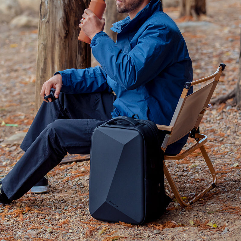 Mark Ryden Global's Diamond-cut Anti-theft Waterproof Laptop Backpack outdoors