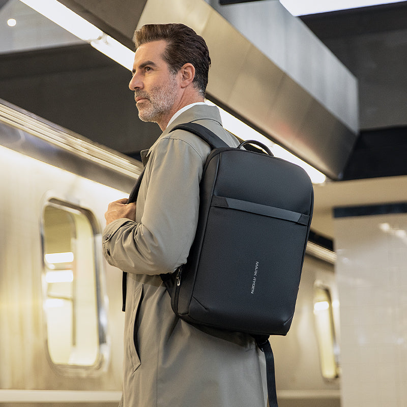 Mark Ryden Voyager Pro black lightweight commuter backpack at subway station