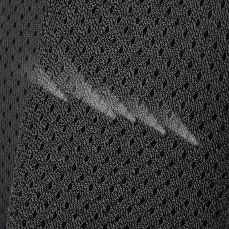 Dark gray mesh fabric of Mark Ryden Softologic I backpack showing water-repellent feature