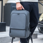 Gray ChargeFlex smart backpack with multiple zippers, power your day - MarkRyden Global