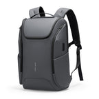 Polycom 2nd gray waterproof backpack with built-in USB port, multiple zippered compartments, and padded black straps for travelling.