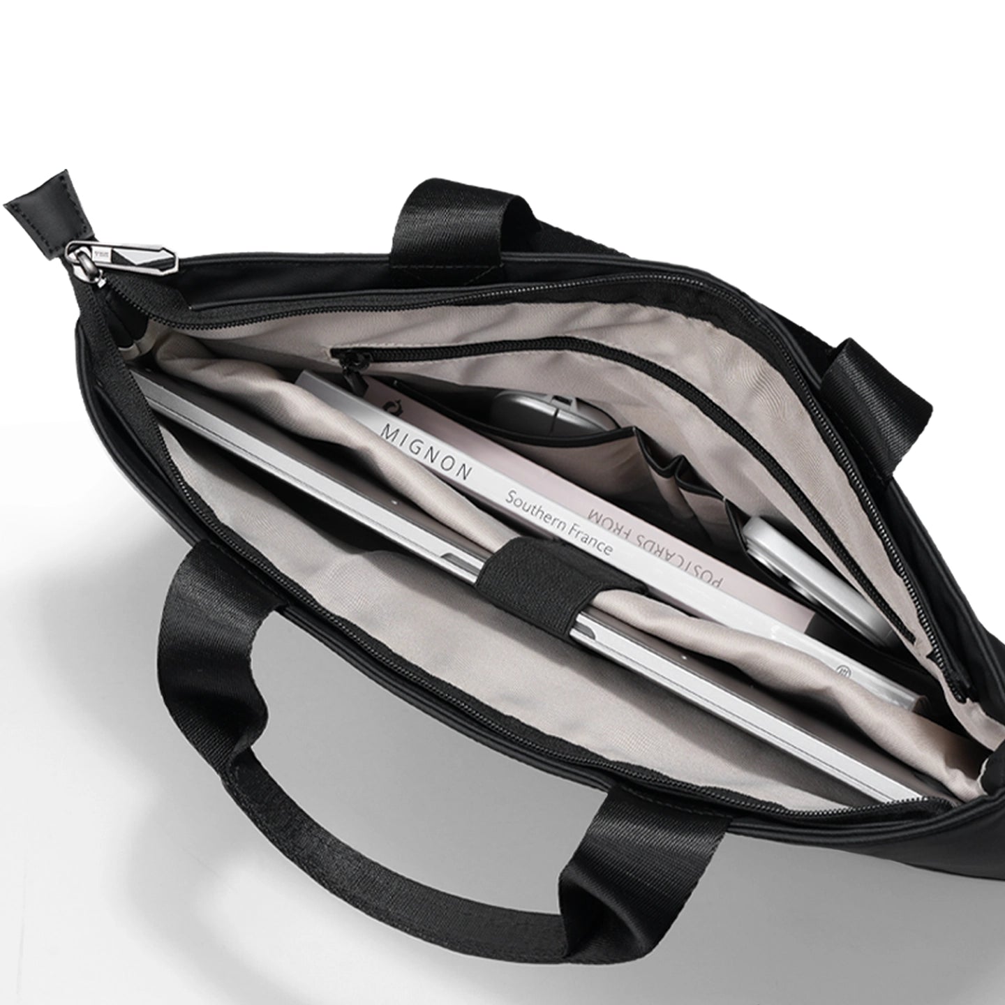 Black FortiCore anti-theft laptop briefcase with organized interior for modern travelers