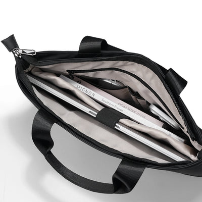 Black FortiCore anti-theft laptop briefcase with organized interior for modern travelers