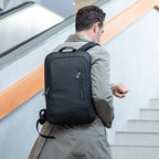 MarkRyden Global UrbanLite Pro sleek black water-resistant business travel backpack on modern traveler
