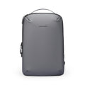 Front view of ZenOrganizer compact gray laptop backpack with sleek design, zippers, and top handle by Mark Ryden