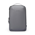 Front view of ZenOrganizer compact gray laptop backpack with sleek design, zippers, and top handle by Mark Ryden