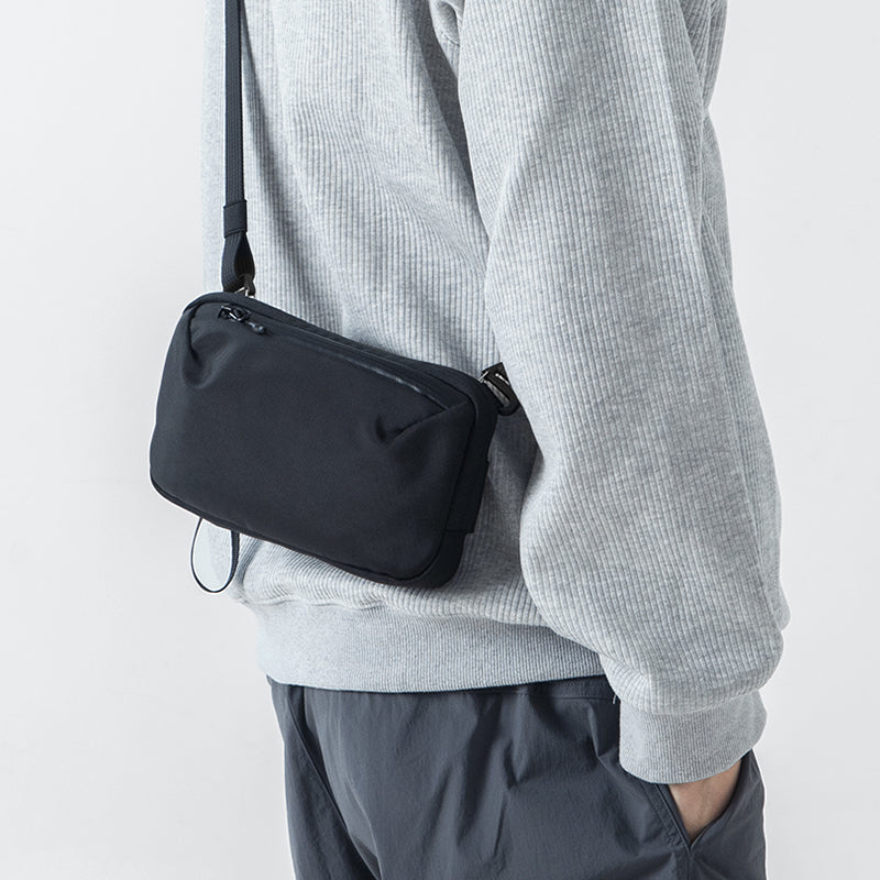MarkRyden Global's Switchstorage IV black crossbody toiletry bag for modern travelers