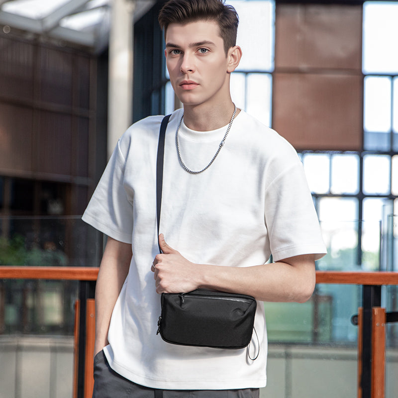Mark Ryden Global black convertible toiletry crossbody bag for modern travelers