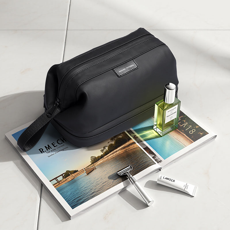 Mark Ryden black toiletry bag with wet/dry areas for modern travelers