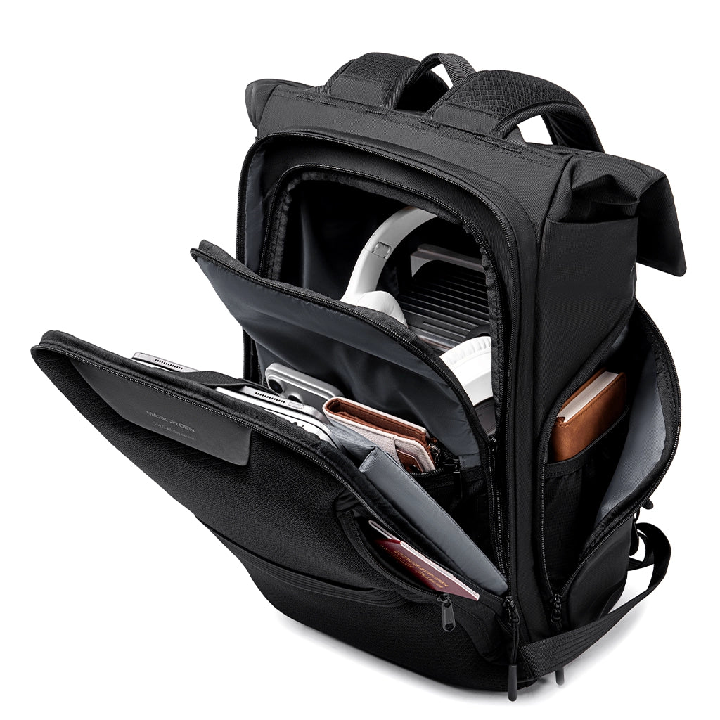 Mark Ryden Global's MorphCore expandable travel backpack with open compartments showing tech & travel accessories