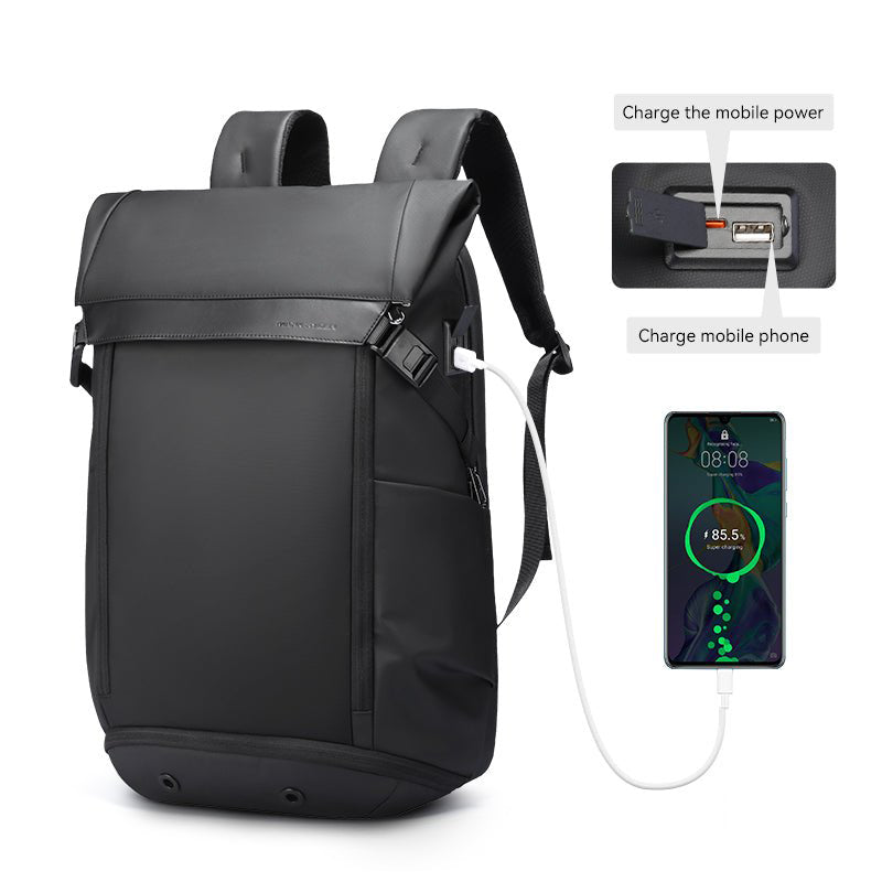 Black Mark Ryden multifunctional backpack with USB charging port, shown charging a smartphone at 85.5%. Sleek design for urban travel.