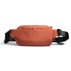 MarkRyden Global's orange anti-theft crossbody bag with secure straps