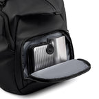 Black anti-theft business travel duffel bag with zippered compartment holding silver cases | MARK RYDEN Global