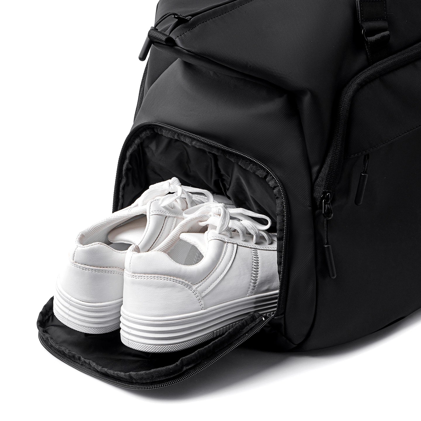 Black TransitPro duffel bag with white sneakers in compartment | MARK RYDEN Global