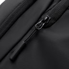 Black textured fabric zipper detail on MARK RYDEN Global TransitPro travel bag