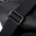 Black textured strap with buckle on MARK RYDEN TransitPro travel duffel bag