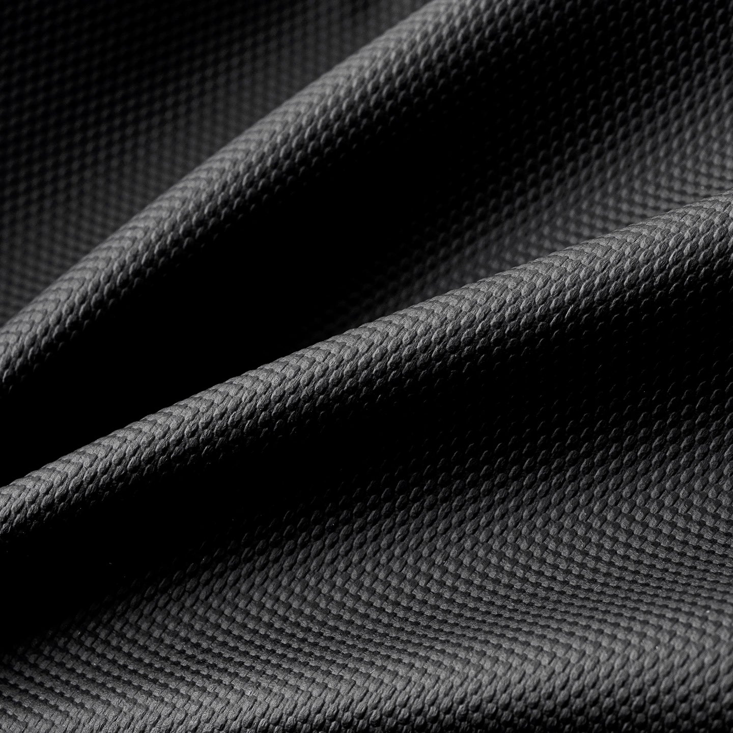 Dark gray textured woven fabric of the TransitPro Business Travel Duffel Bag for Men, large weekender carry on.