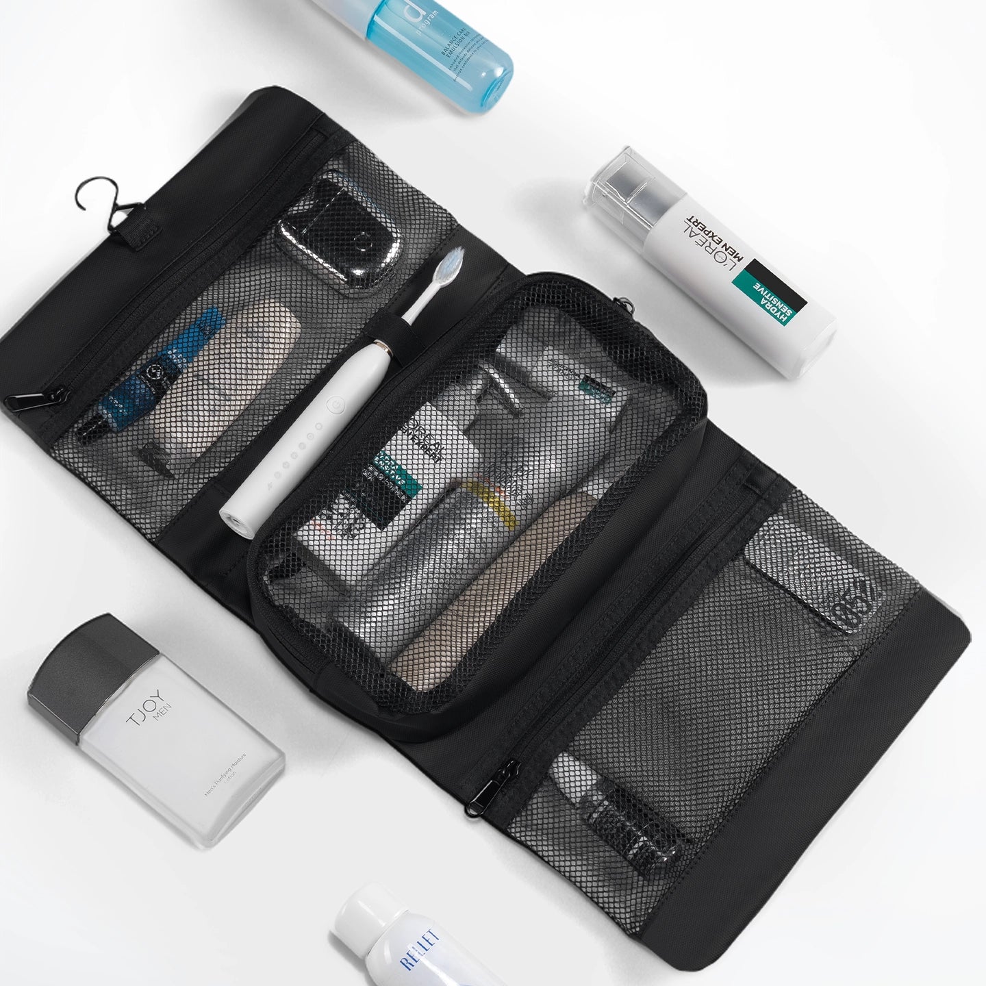 Mark Ryden Global black mesh toiletry bag with separate wet-dry sections, toothbrush holder for modern travelers